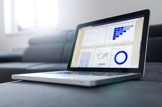 Healthcare operations team reviewing eligibility data on a laptop dashboard
