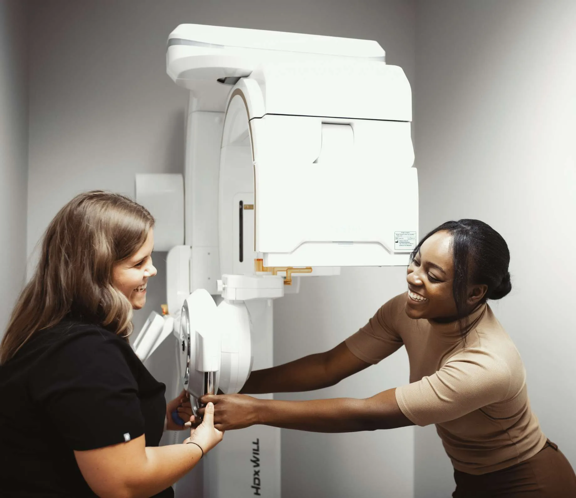 Hygienist prepping a patient to get their x-rays