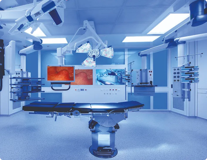 A man working as a tech support employee with woman coworker in the background