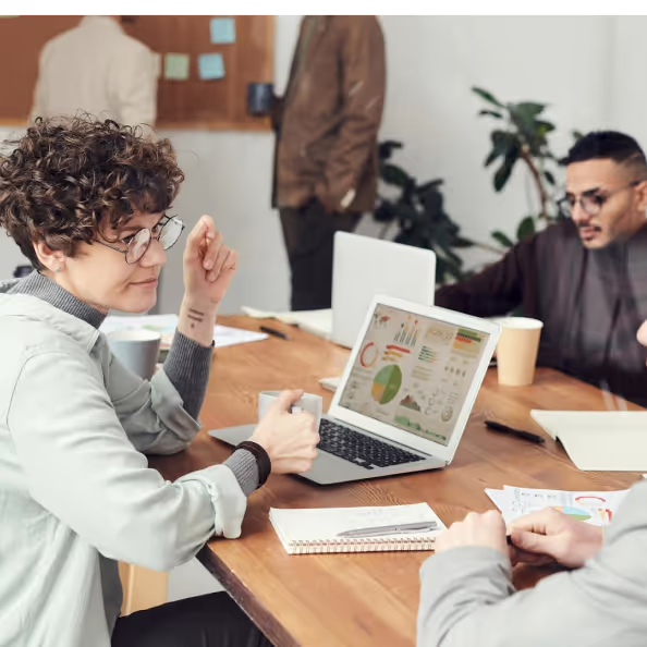 A group of professionals engaged in a collaborative strategy meeting