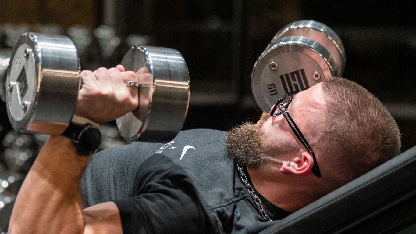 Jeremy performing incline dumbbell chest exercise