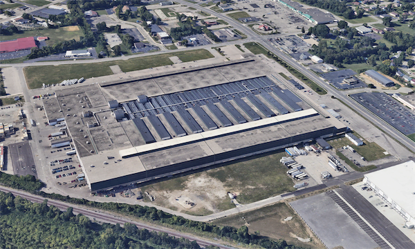 Commonwealth warehouse worker wearing CWI hardhat at Fairfield location