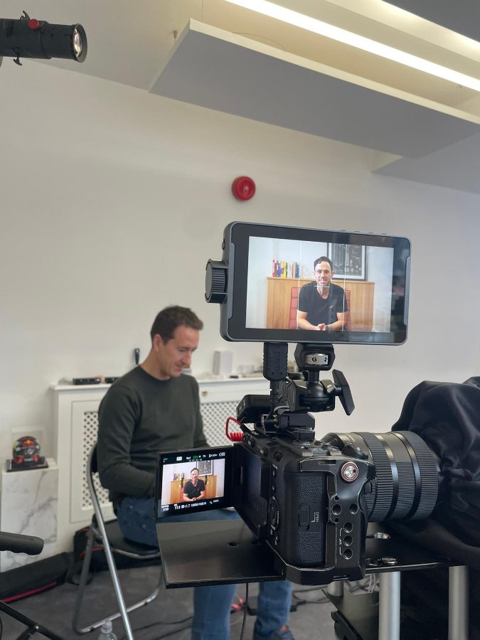 Filming with the crew directing