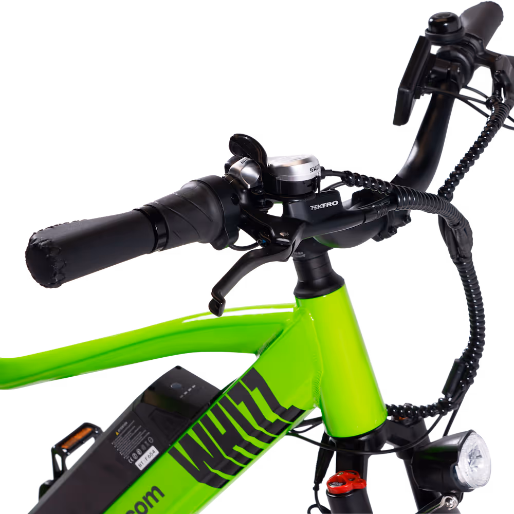 Close-up of bright green electric bike handlebar with black grips, brake lever, gear shifter, and front light.