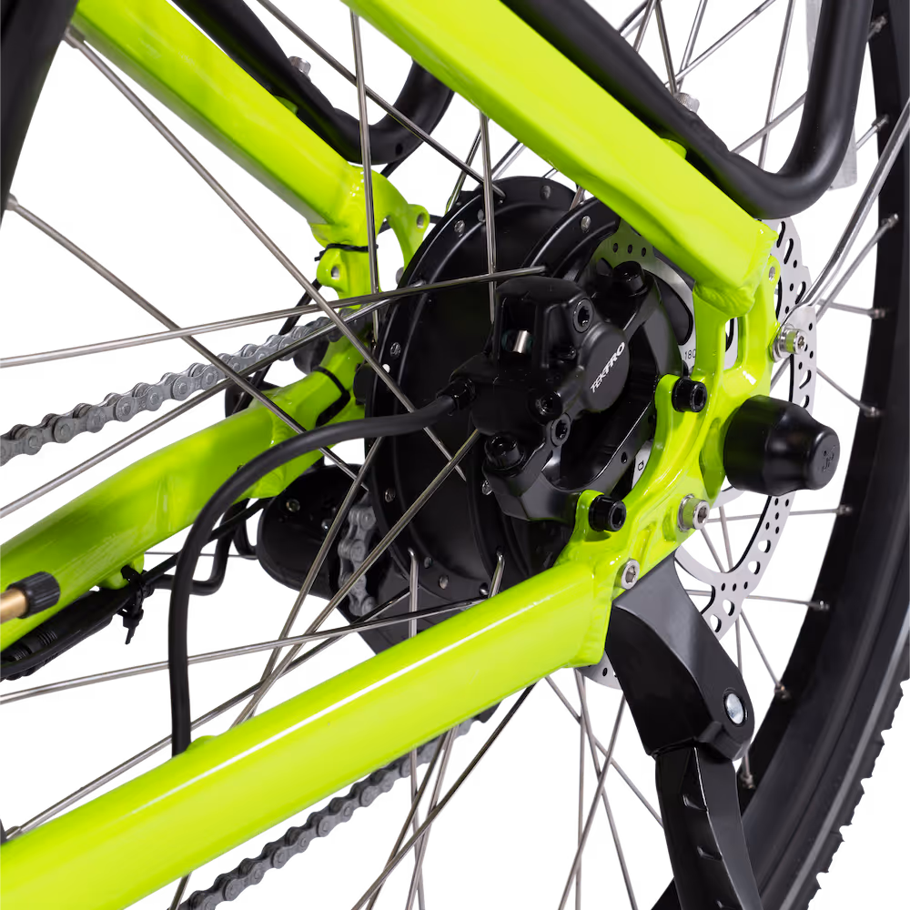 Close-up of a neon green bicycle rear wheel hub motor with disc brake, chain, and spokes.