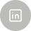 LinkedIn icon inside a gray circular background.