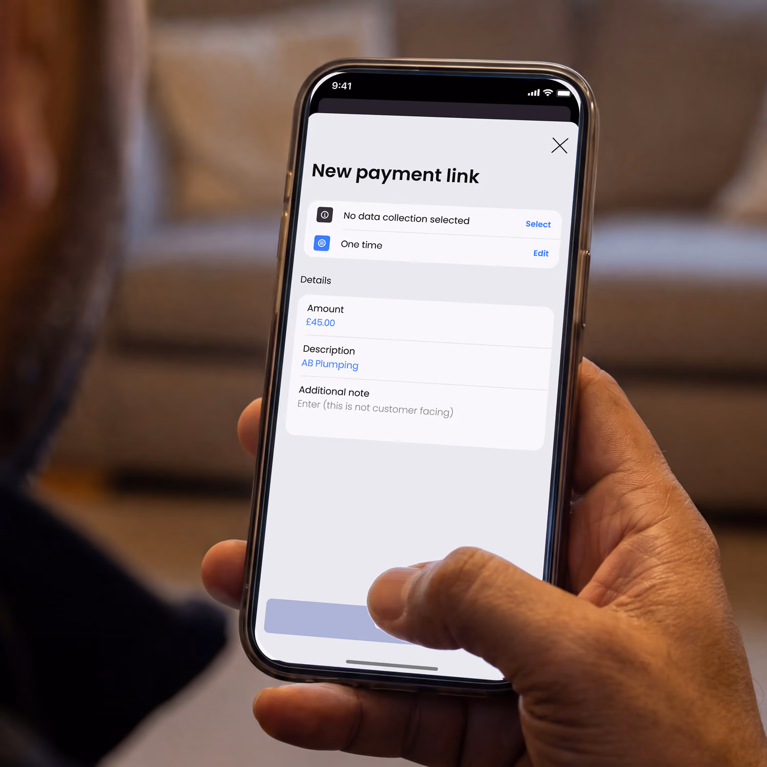 Hand holding smartphone showing taxi payment processing app with recent activity and £2043.49 balance.