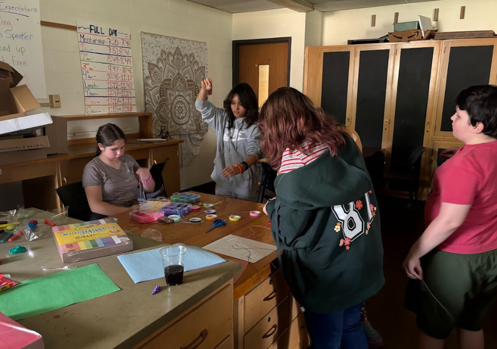 Students preparing for a party with streamers, etc.