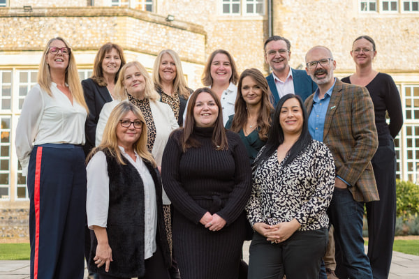 The Home Counties Carers team together outside their office