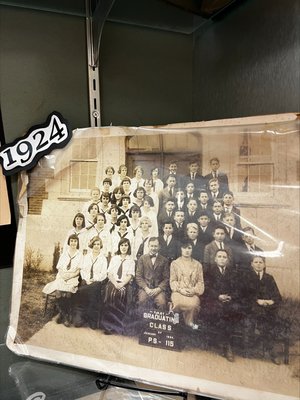 1924 graduating class group photo displayed at PS 115