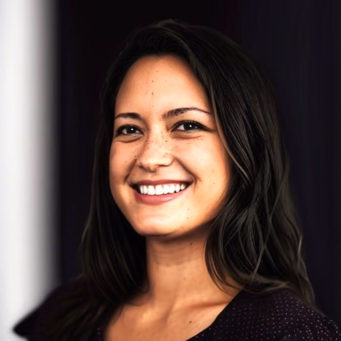 Smiling woman with long dark hair against a dark background.