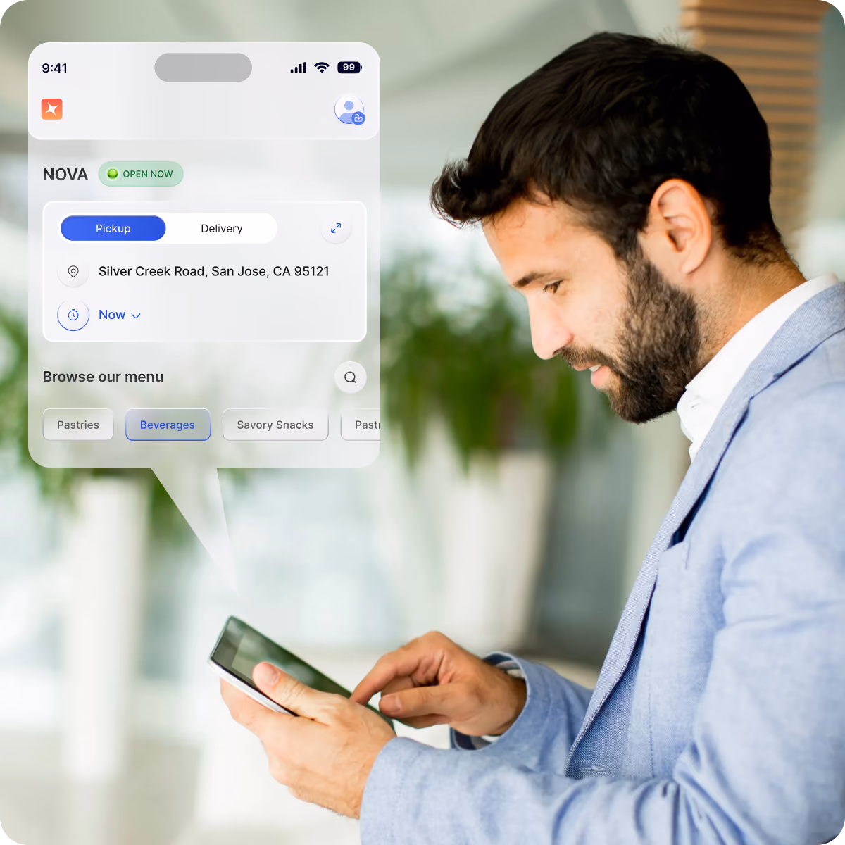 Man in a light blue blazer using a smartphone with a transparent overlay of a food ordering app showing options for pickup or delivery, a location in San Jose, CA, and menu categories including pastries and beverages.