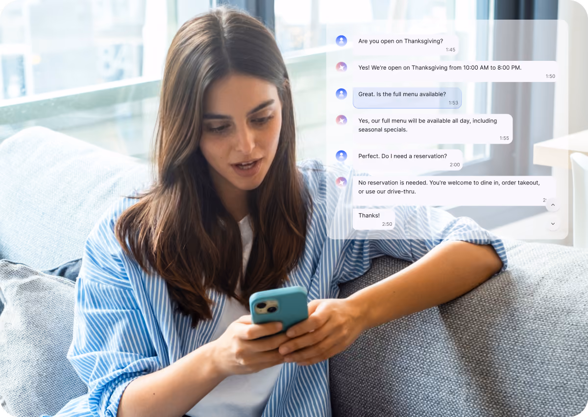 Young woman sitting on a couch holding a smartphone and looking at it, with a conversation overlay about Thanksgiving hours and reservation policy.