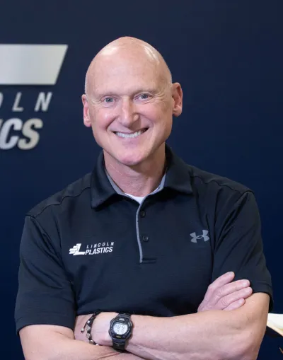 headshot/portrait of dominic pynes, the president of lincoln plastics