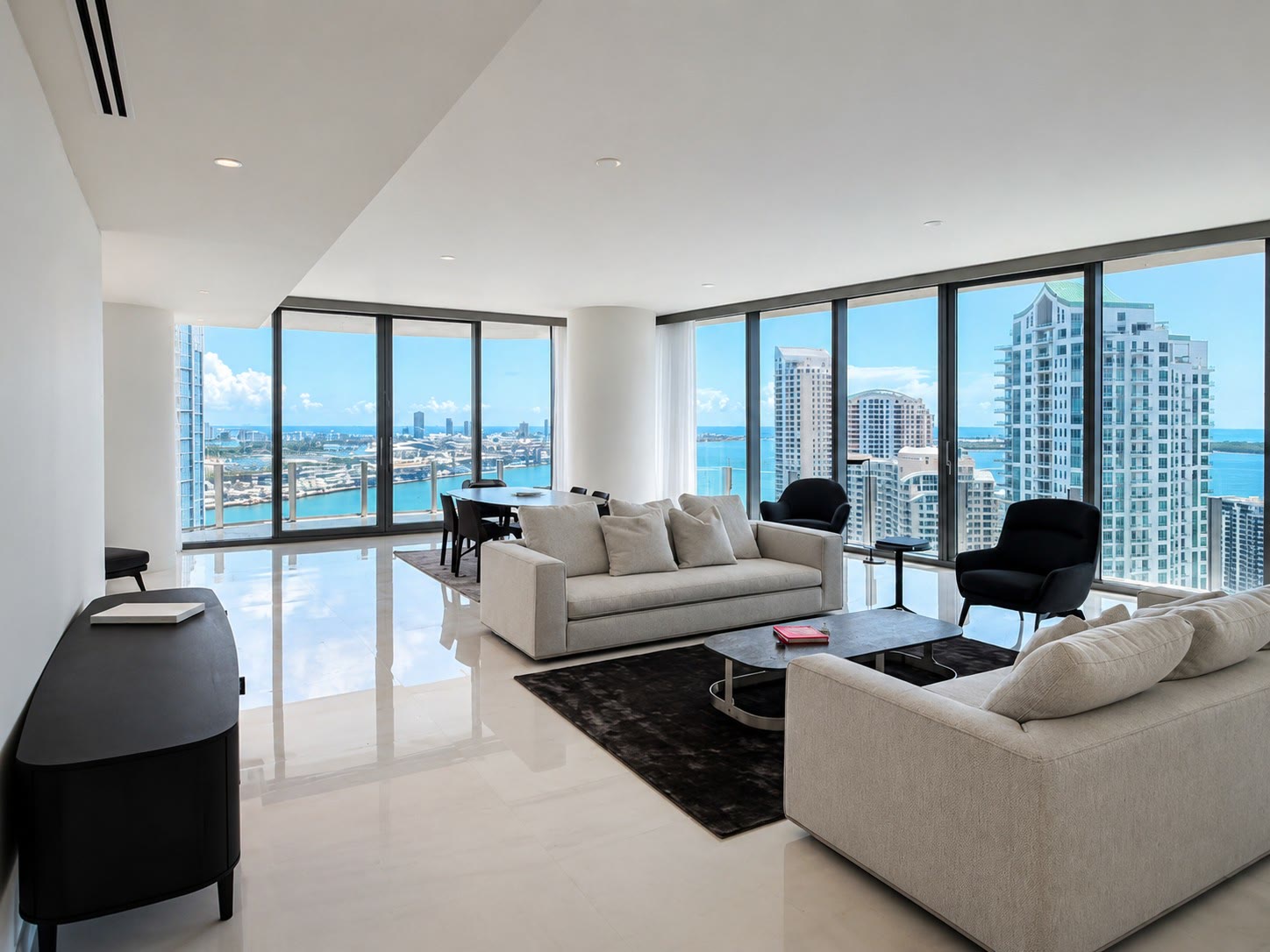 Living room opening to the terrace and water