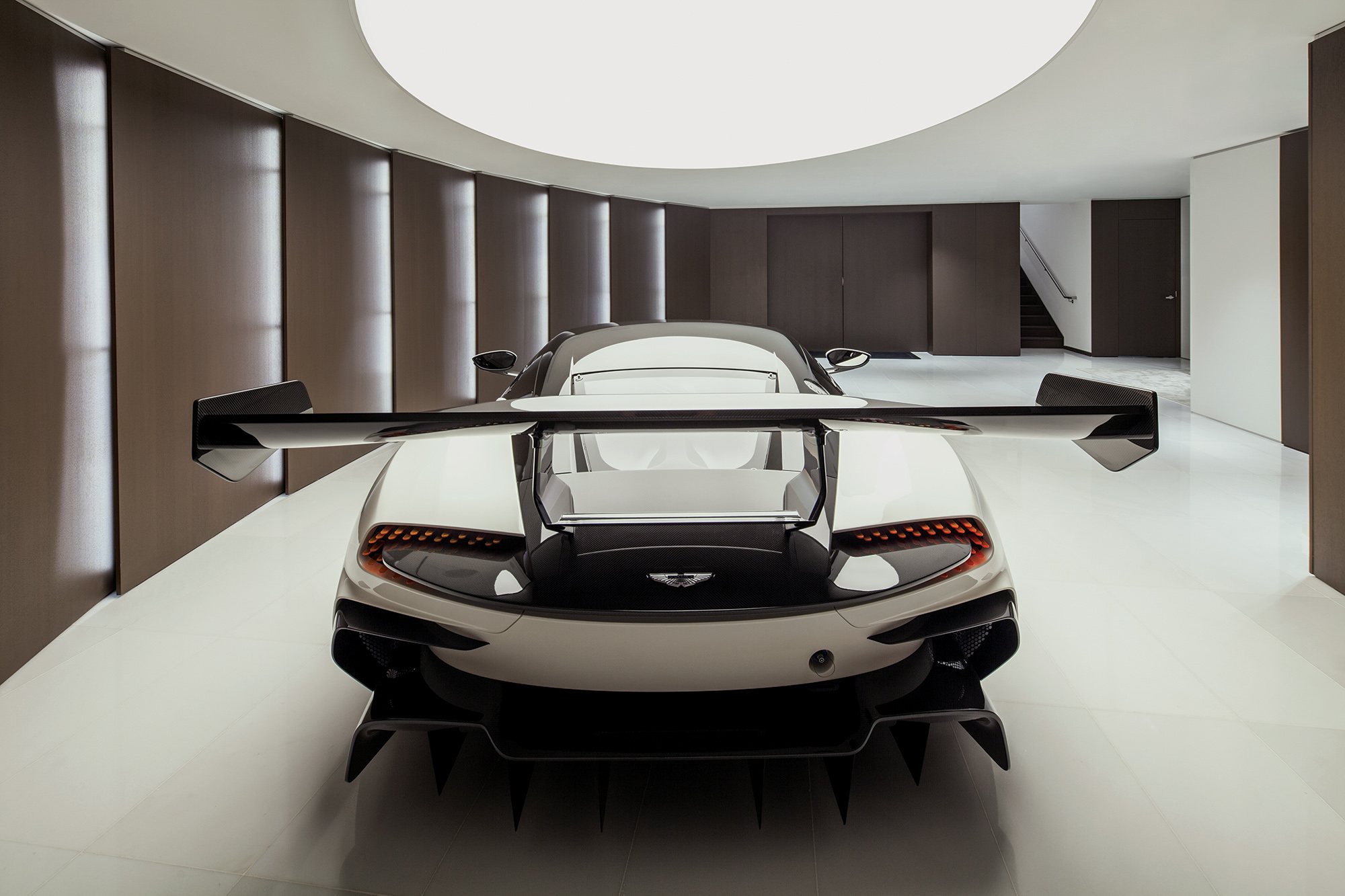 Rear view of the Aston Martin included with Residence 6301