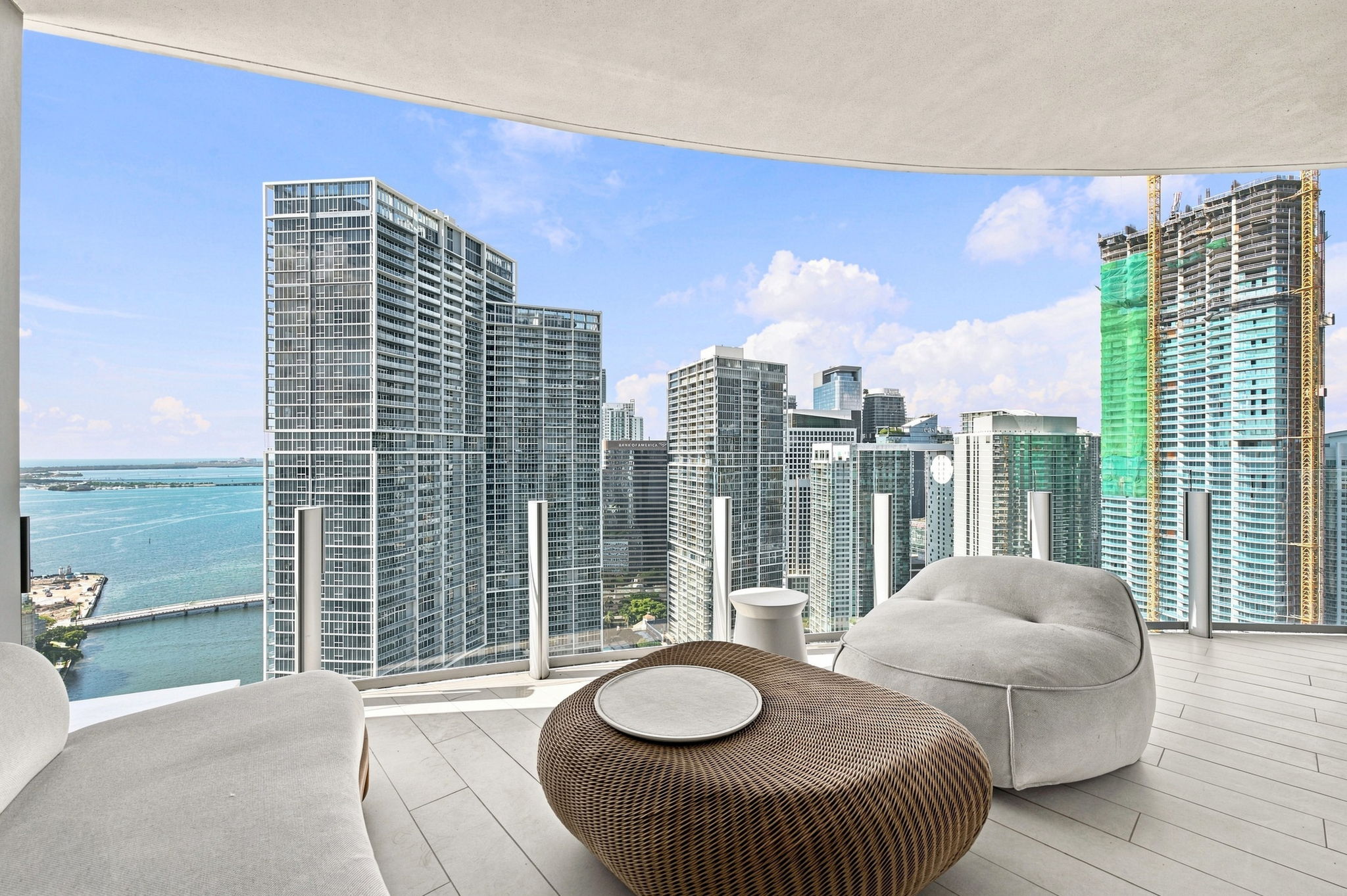 Terrace lounge with city skyline views — Residence 3807