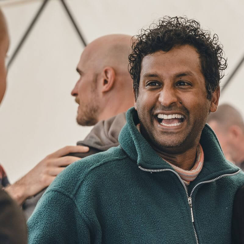 Men smiling with clarity and strength after the Return of Men Retreat, reflecting healing, brotherhood, and renewed purpose.