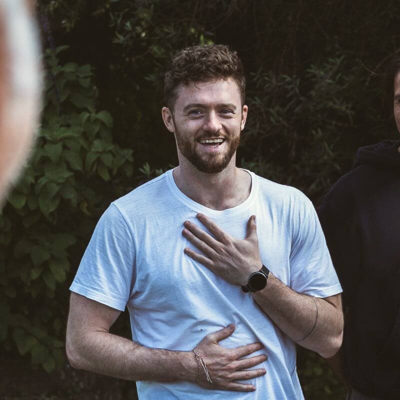 Men smiling with clarity and strength after the Return of Men Retreat, reflecting healing, brotherhood, and renewed purpose.