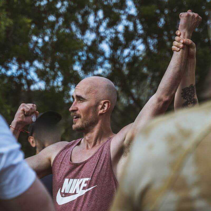 Men smiling with clarity and strength after the Return of Men Retreat, reflecting healing, brotherhood, and renewed purpose.