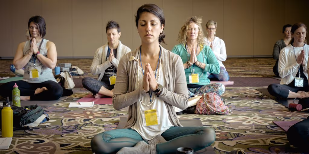 group of people doing yoga