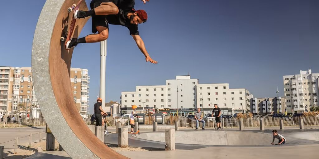 a man doing a trick on a skateboard