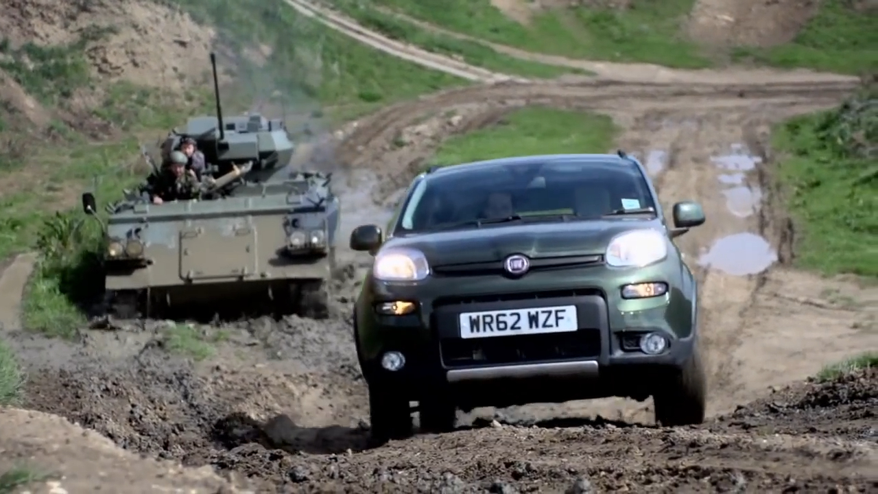 Fiat Panda 4x4 racing a tank off-road