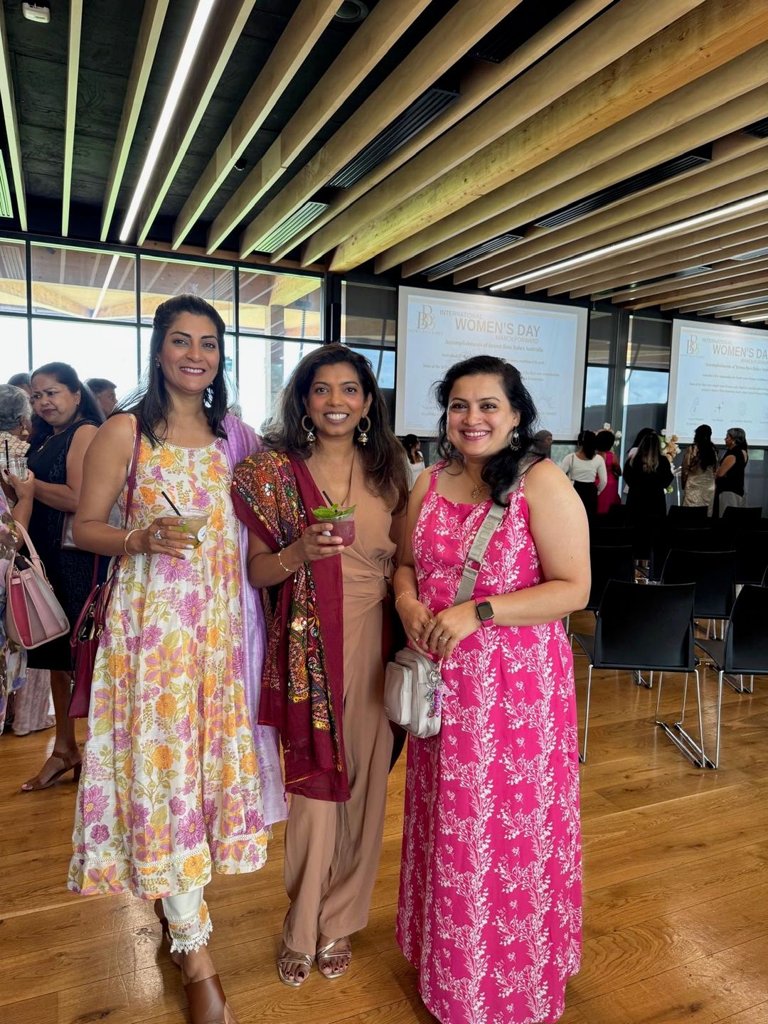 Guests with mocktails at a community celebration