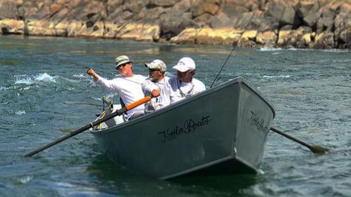 Fly fishing guide and anglers on the river at Bravo Sur Lodge