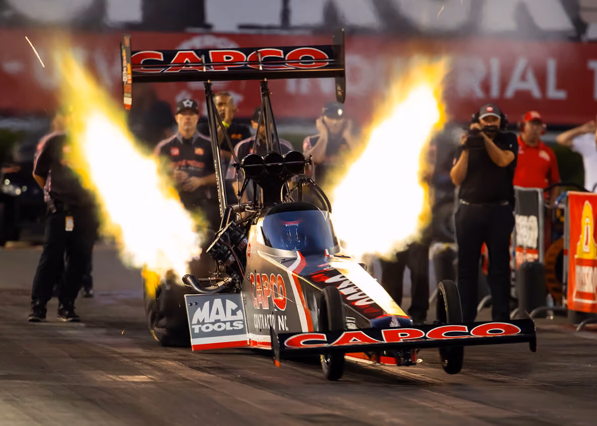 Steve Torrence launches off the line in his NHRA Top Fuel Dragster.