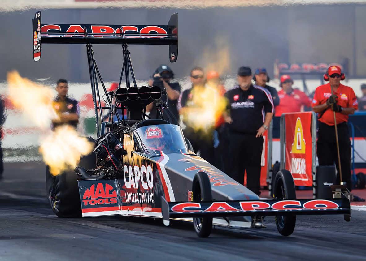 Steve Torrence launches off the line in his NHRA Top Fuel Dragster.