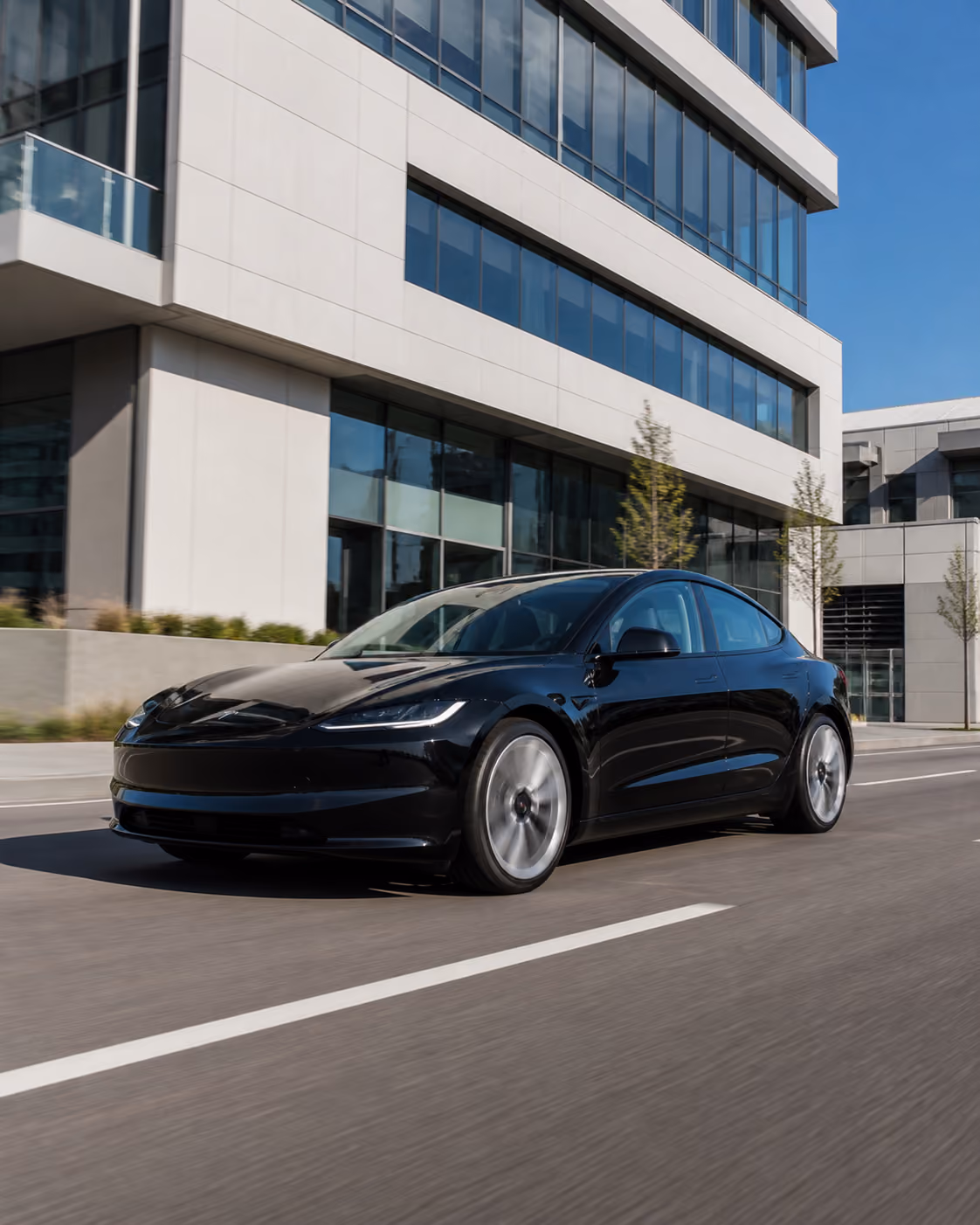 Dark silhouette of Tesla Model Y in studio