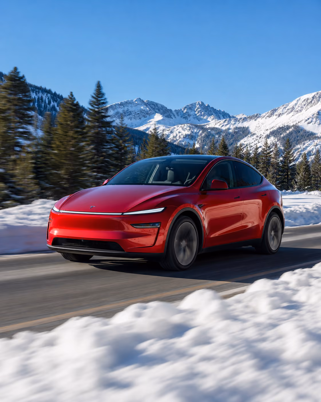 Tesla Model S driving along coastal highway