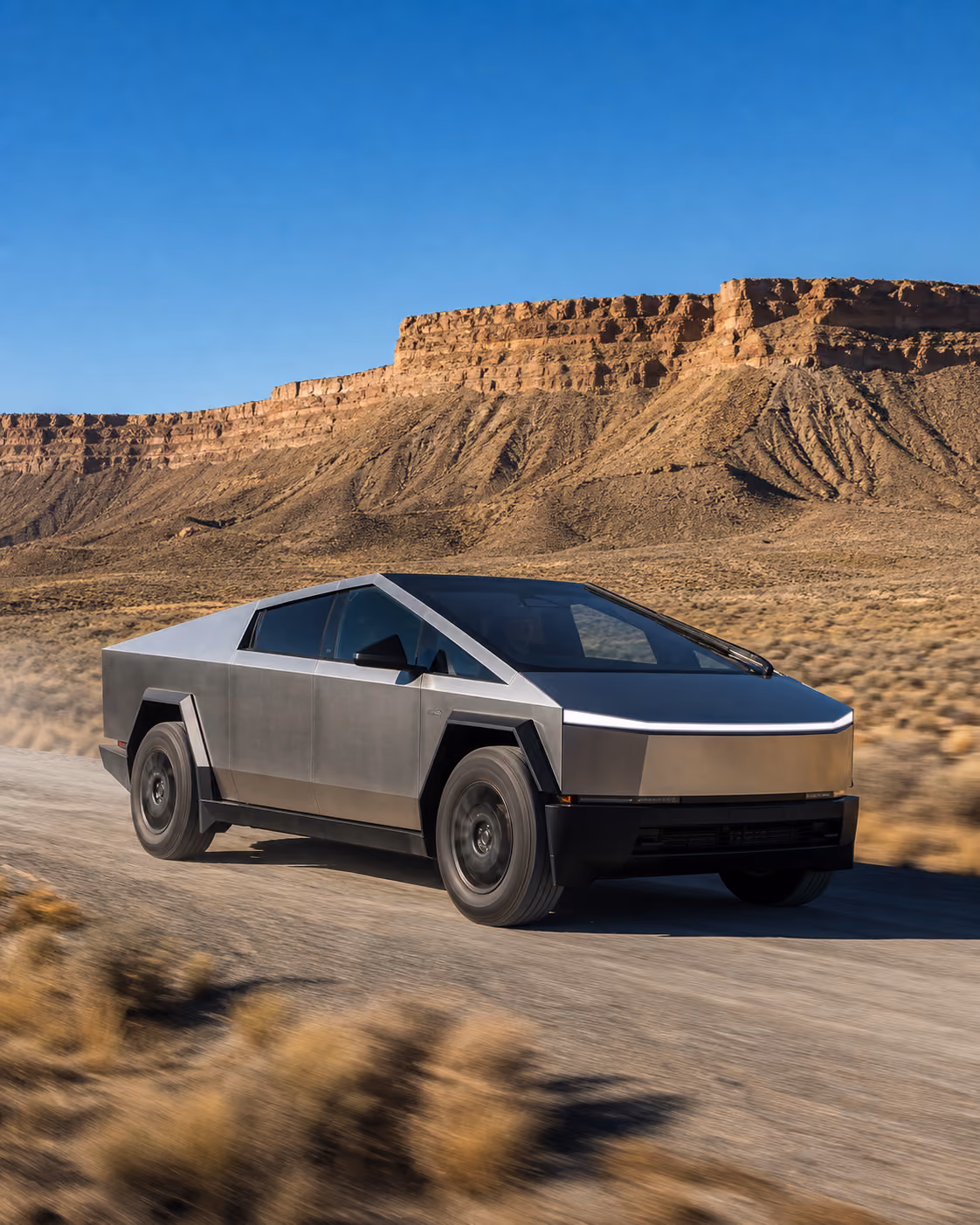 Tesla Cybertruck parked at remote campsite