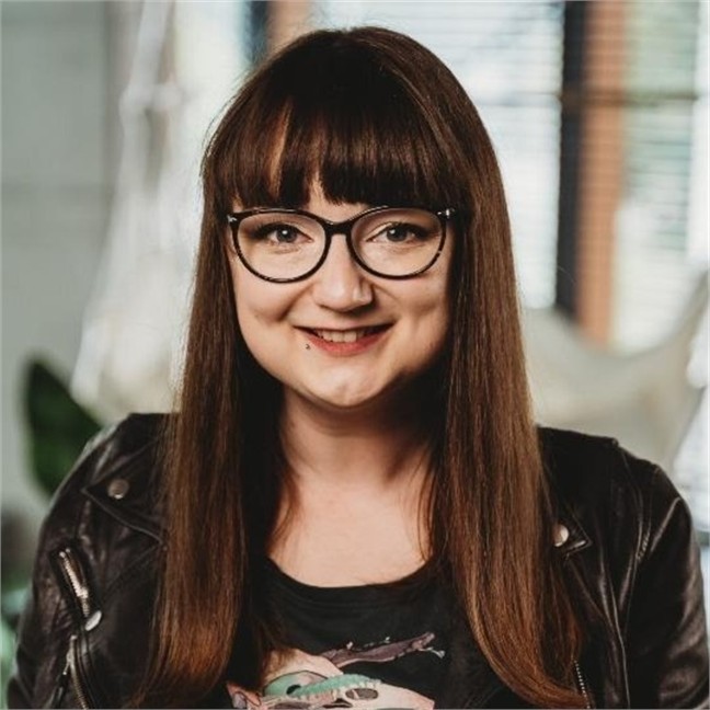 a portrait of Joanna Pawłowska, Head of Design at Synergy Codes