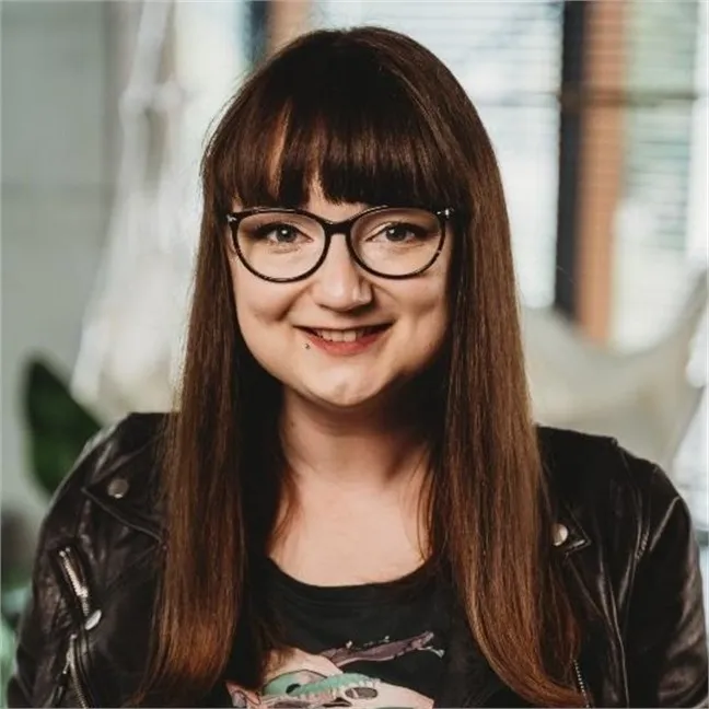 a portrait of Joanna Pawłowska, Head of Design at Synergy Codes