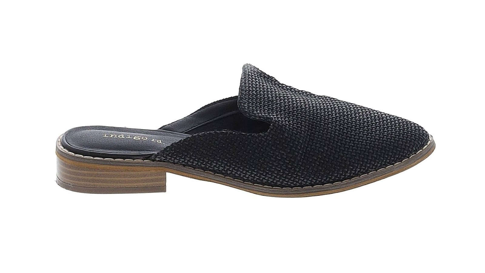A black slip-on mule on a white background.