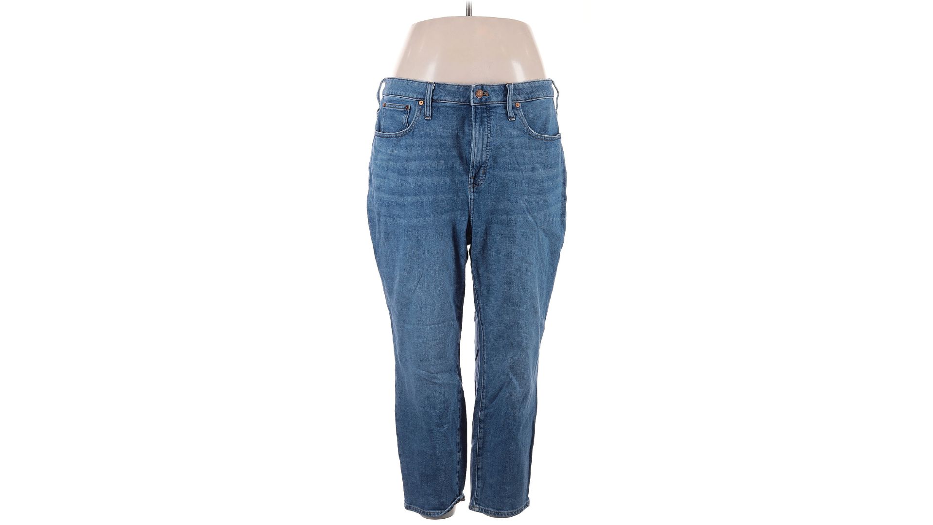 An image of a blue jeans from Madewell displayed on a mannequin against a white background.