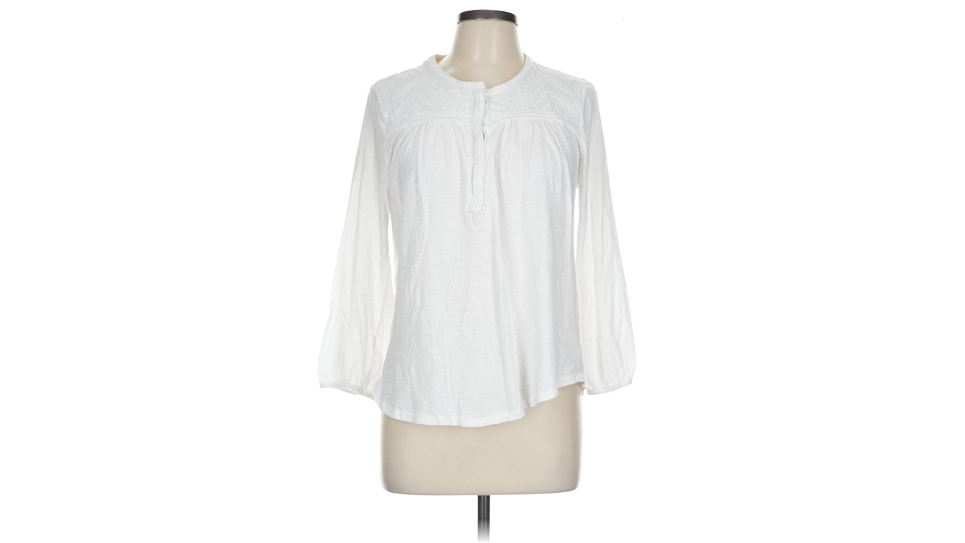 An image of a white blouse from Lucky Brand displayed on a mannequin against a white background.