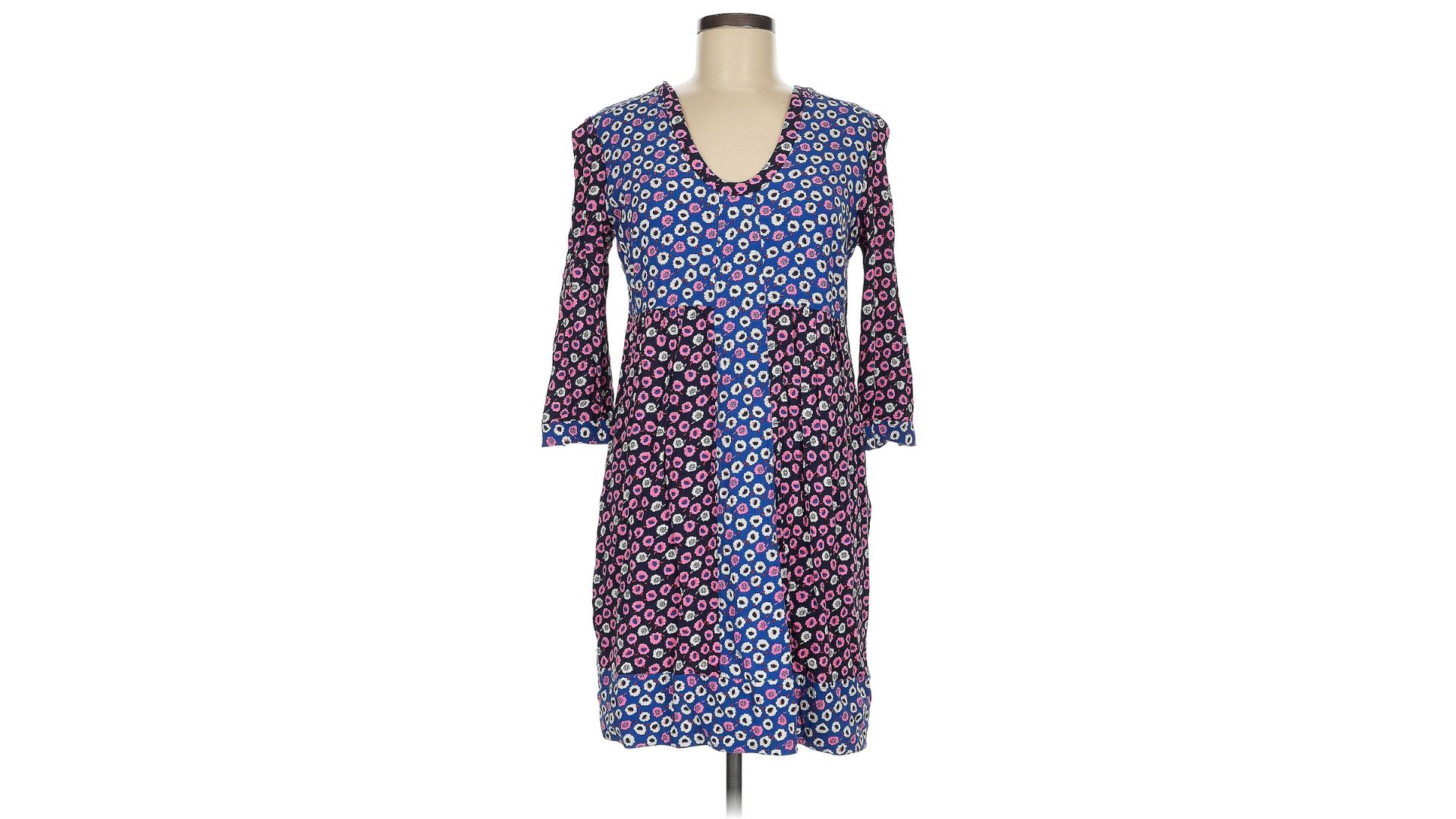 An image of a colorful patterned dress with long sleeves from Boden displayed on a mannequin against a white background.