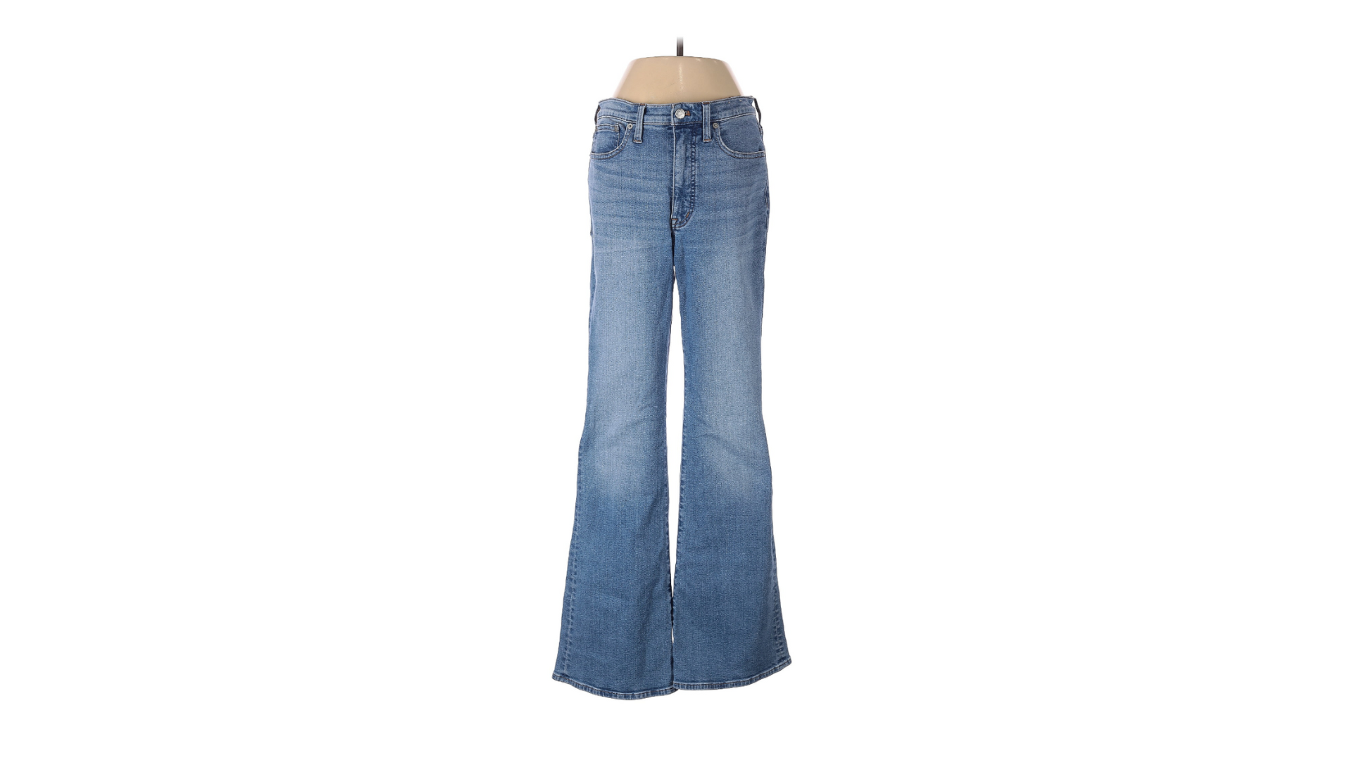 Flared blue jeans on a mannequin.