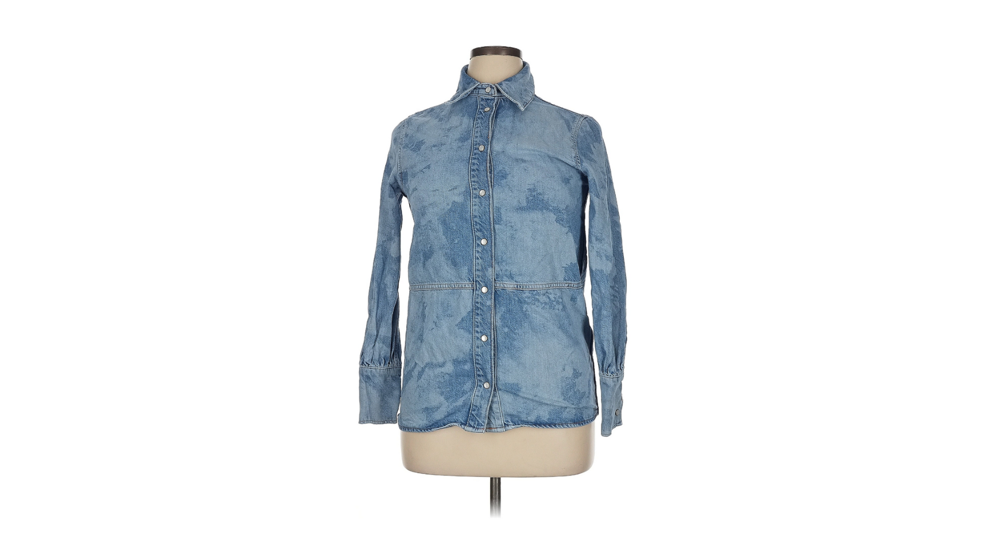 A denim jacket on a mannequin.