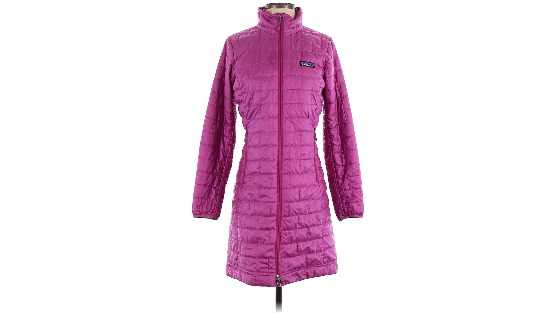 A pink Patagonia parka on a mannequin.