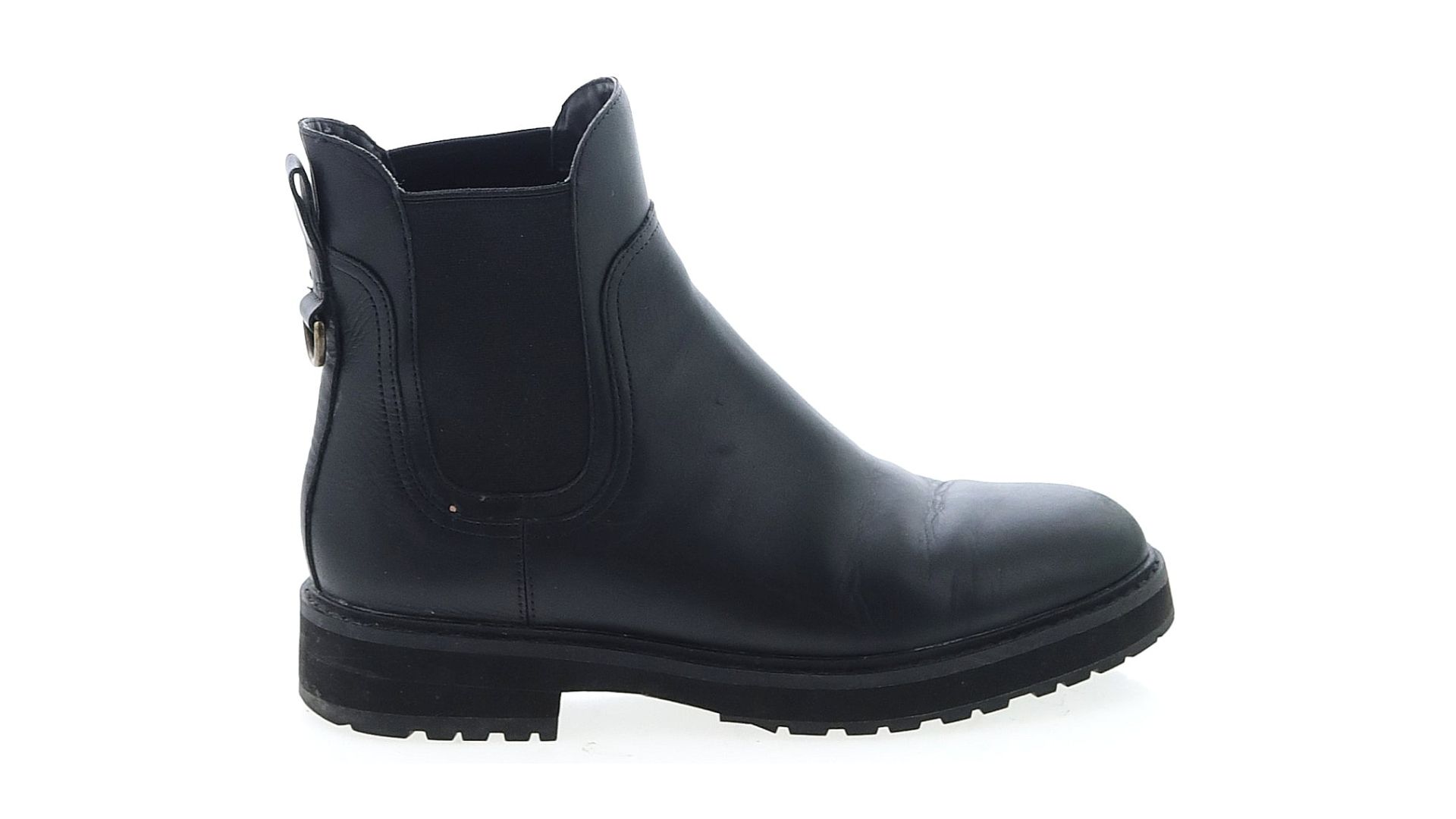 A black Cole Haan Greenwich Chelsea boot.