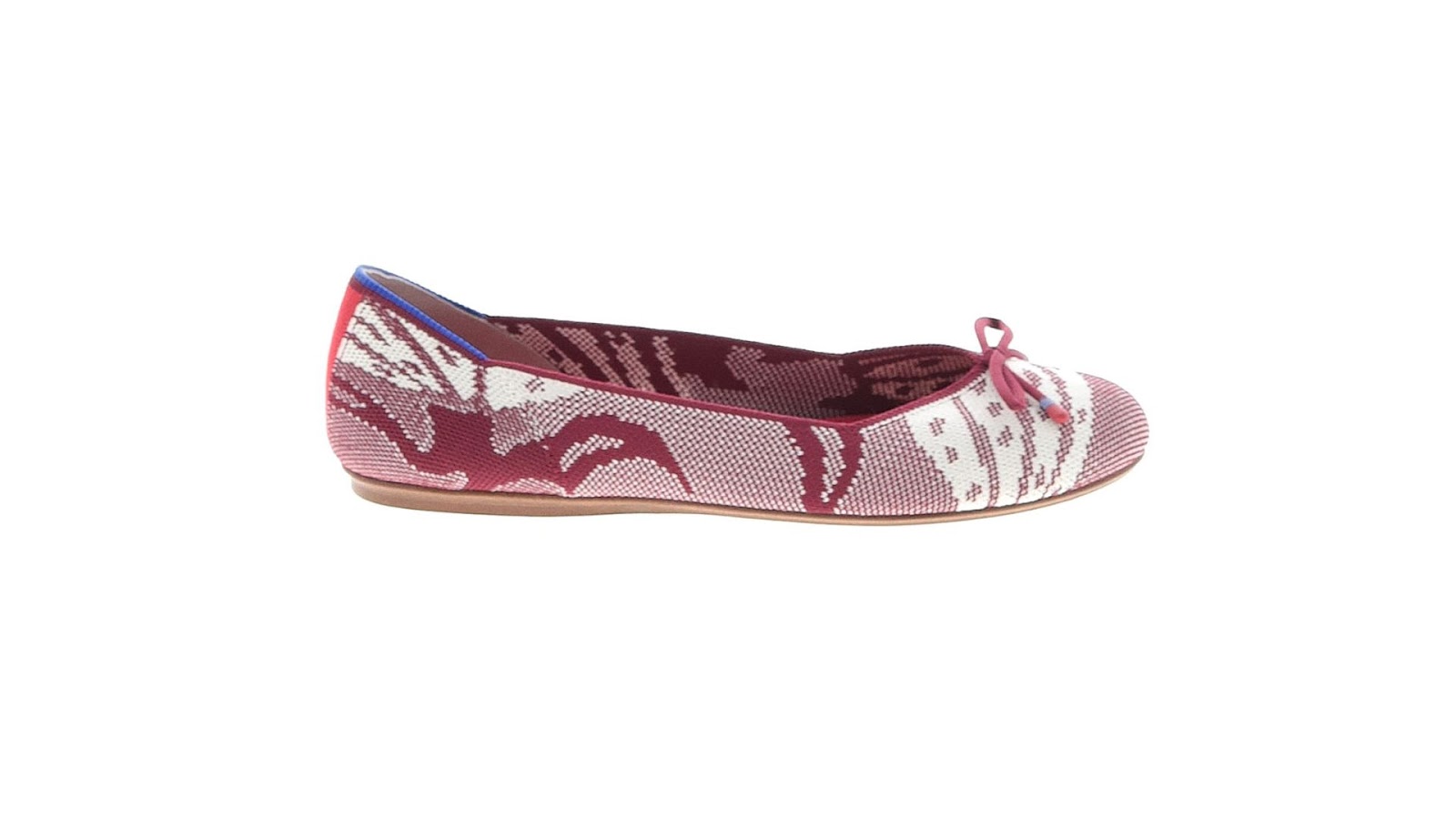 A pink Rothy's ballerina flats with design.