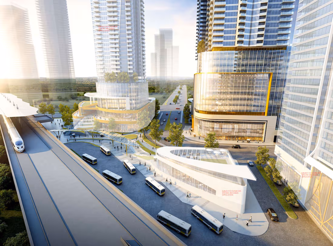 Modern urban transit center with buses, pedestrians, and high-rise buildings with glass facades.