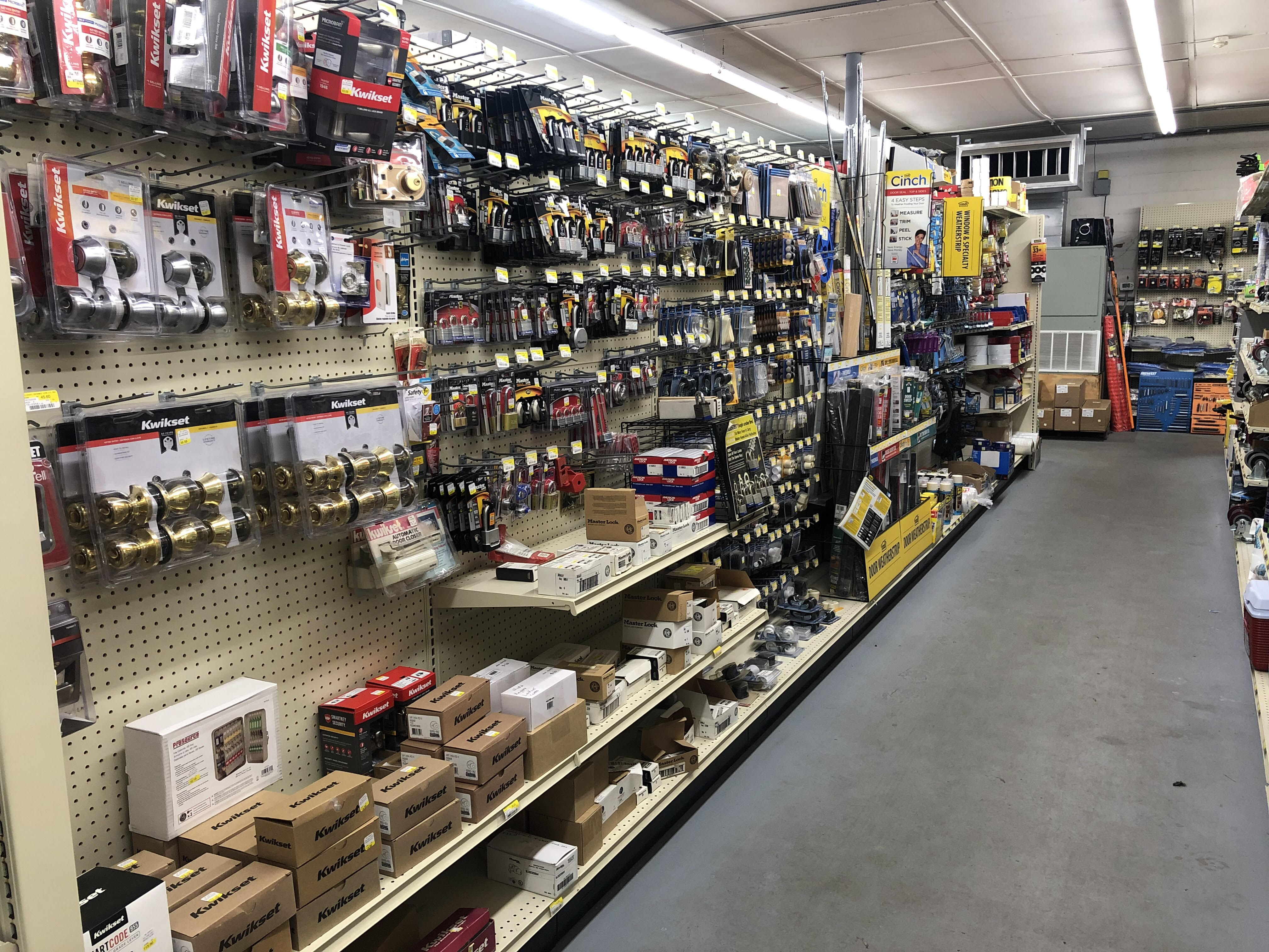 Hardware store aisle with locks, tools, and home improvement supplies