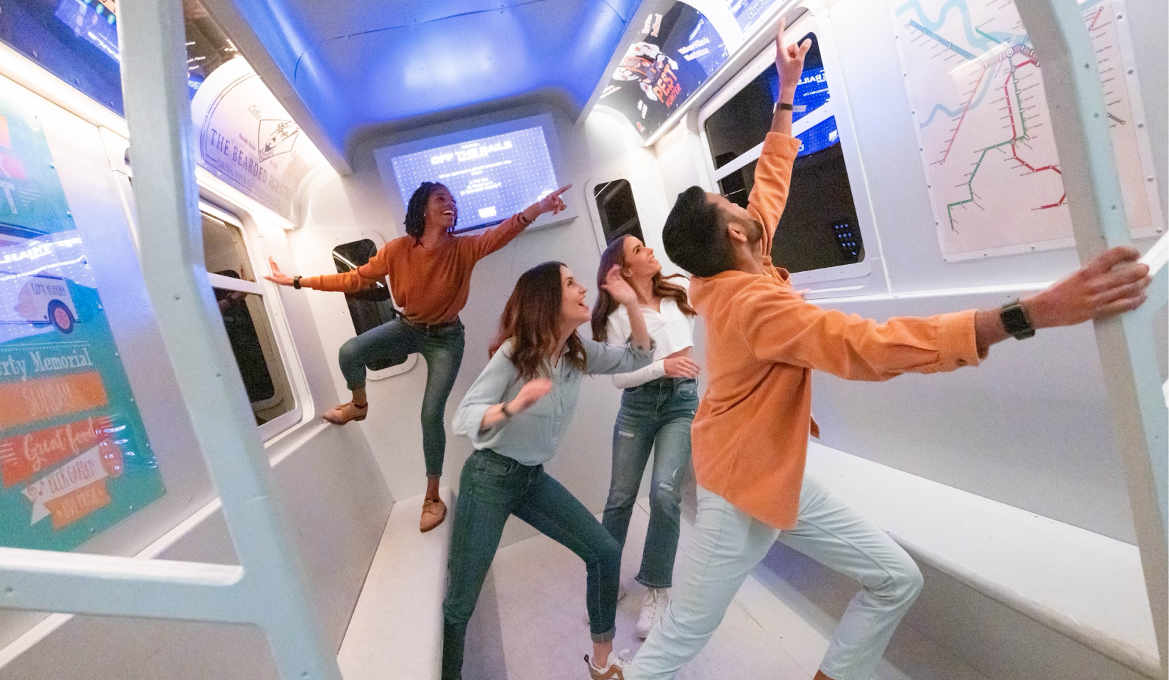 A group playing an immersive BRKTHROUGH challenge room