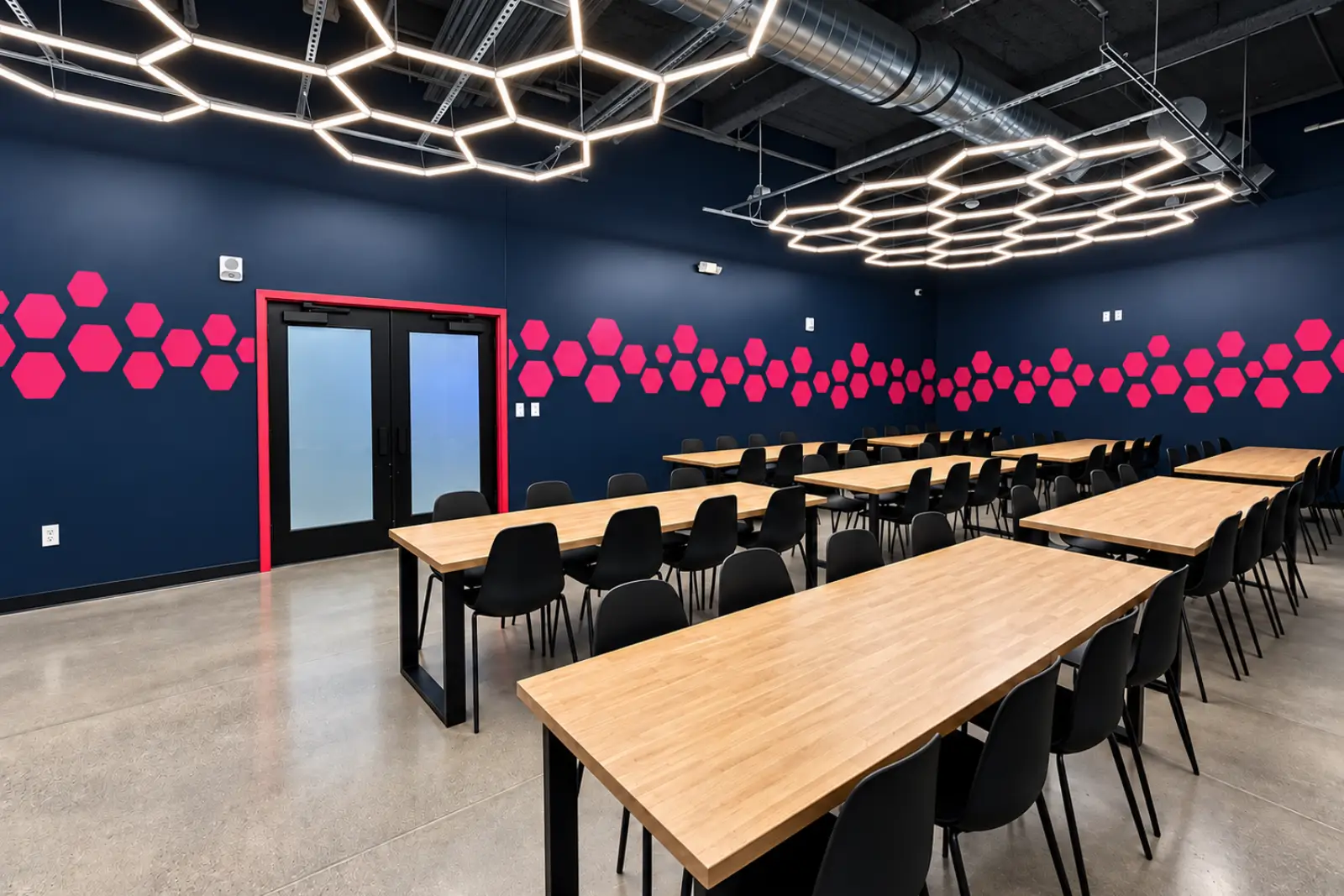 Guests enjoying a BRKTHROUGH challenge room; sample event-space imagery