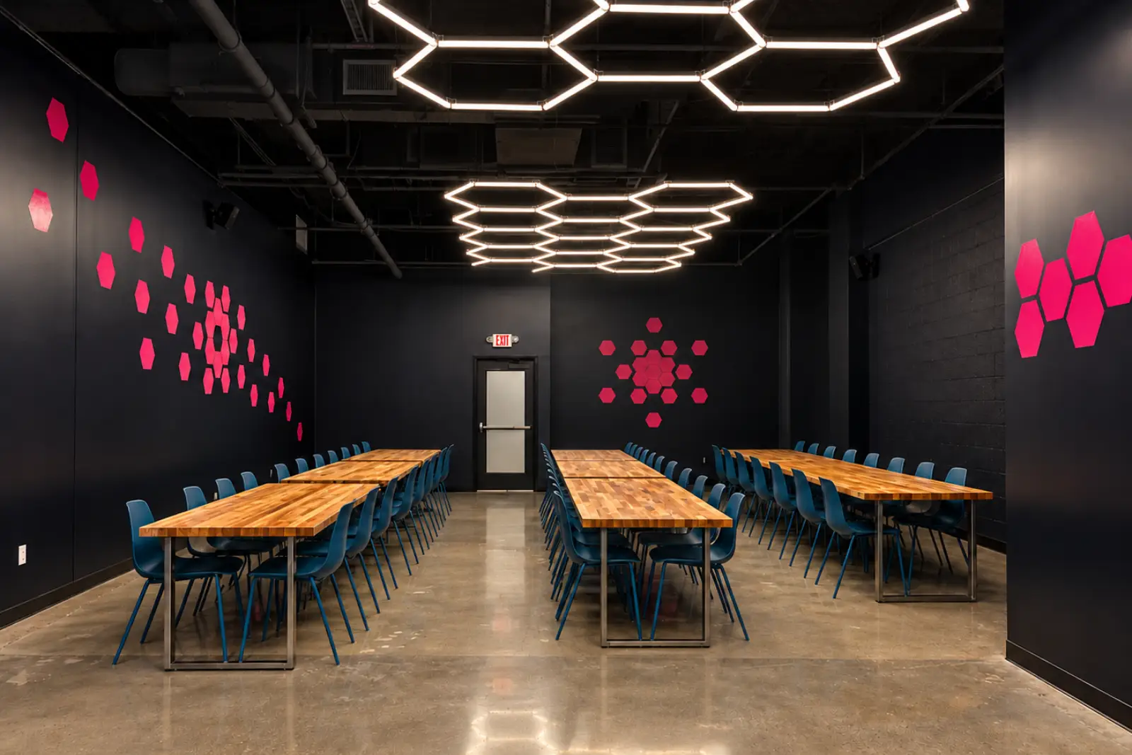 Guests enjoying a BRKTHROUGH challenge room; sample event-space imagery